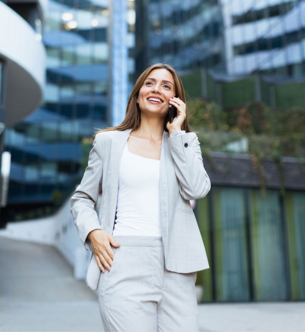 Professional business woman making a phone call.