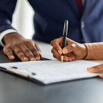 Woman signing documents